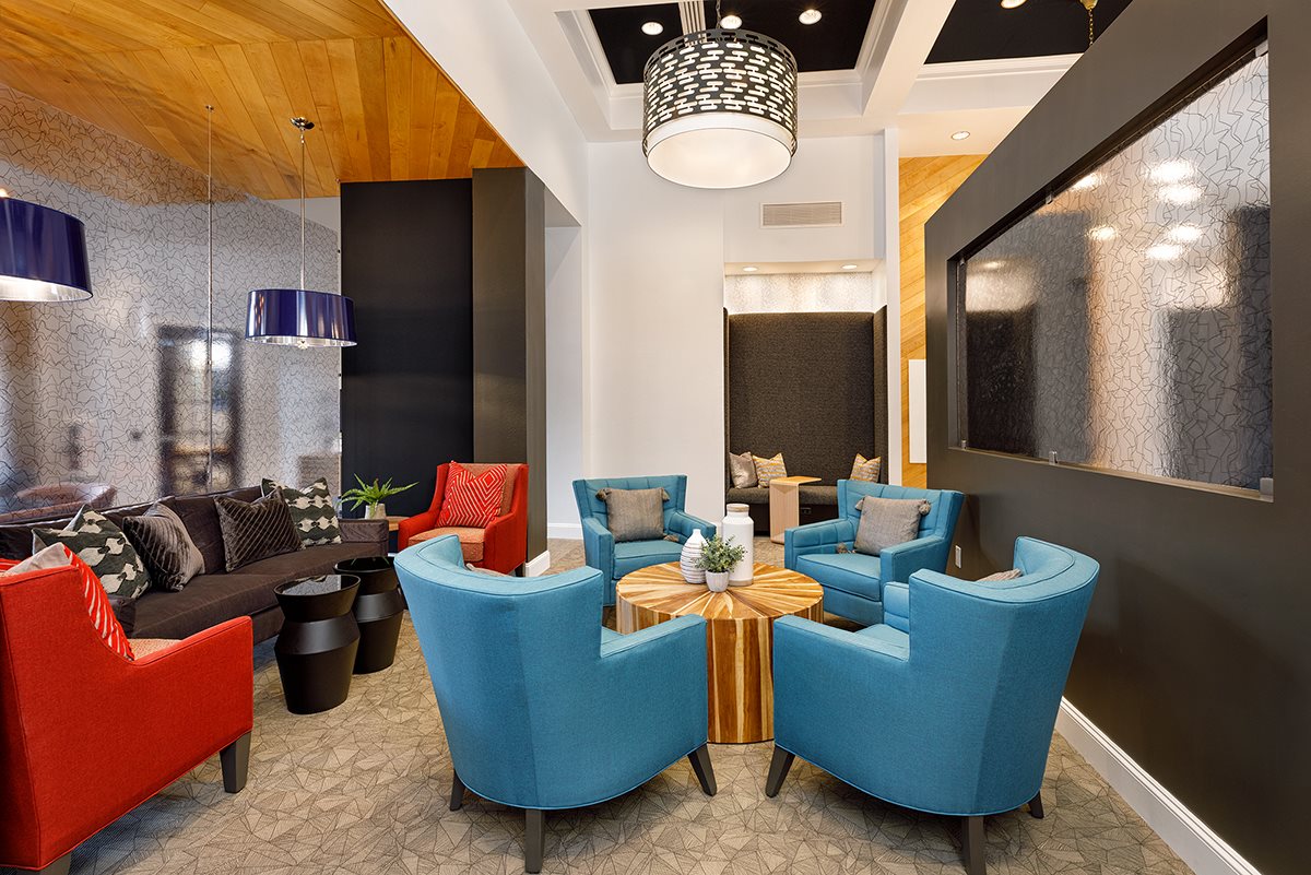 Amenity lounge seating at The Belmont, multifamily interior design by McNeill Brown